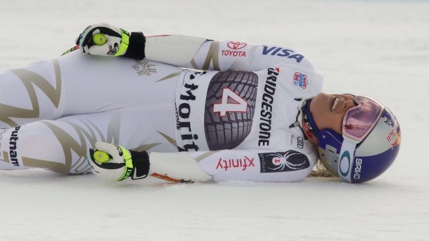 Lindsey Vonn grimaces in pain after getting to the finish area after a recent race in Switzerland.