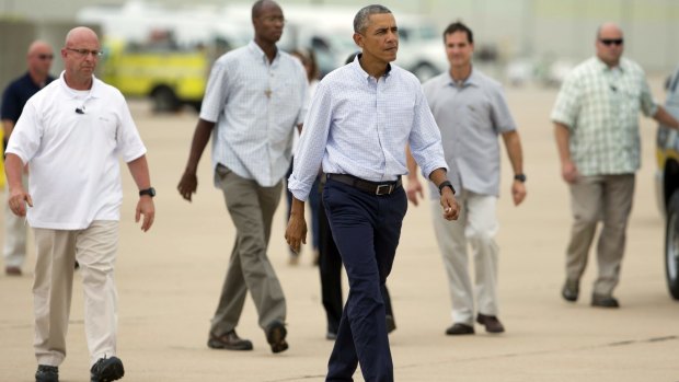 African intervention: US President Barack Obama ready to board Air Force One in California on Monday.