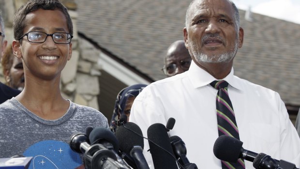 Ahmed Mohamed, 14, left, and his father, Mohamed Elhassan Mohamed, thank supporters during a news conference two days after his arrest in September.