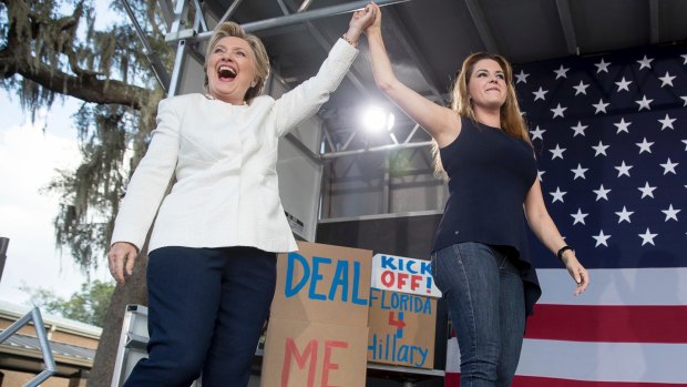 Democratic presidential candidate Hillary Clinton takes the stage with former Miss Universe Alicia Machado, in Dade City, Florida.