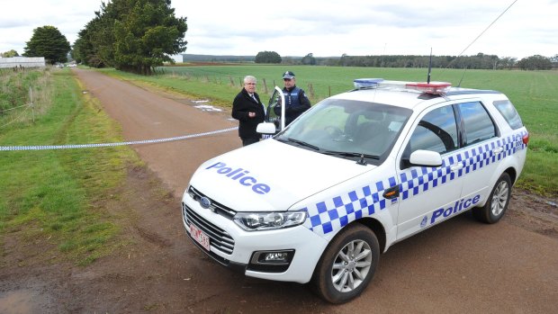 Police at the property near Ballarat where Ken Handford's body was found.