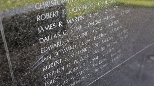 The NSW Police Force Wall of Remembrance was scratched in Friday's vandal attack. 