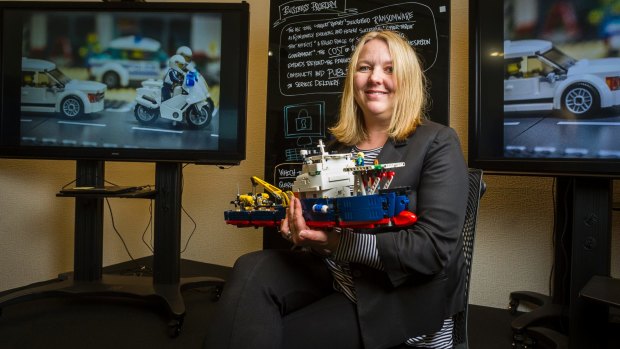 National manager of cyber security at DHS Narelle Devine with a Lego model to be used in cyber war games this year.