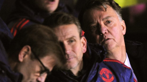 Relief: Manchester United manager Louis van Gaal, right.