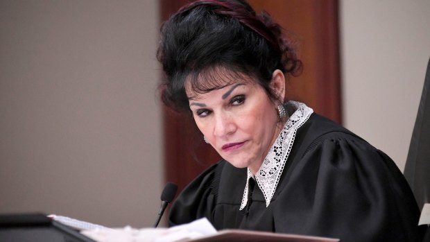 Judge Rosemarie Aquilina listens to a victim statement during Larry Nassar's sentencing hearing.