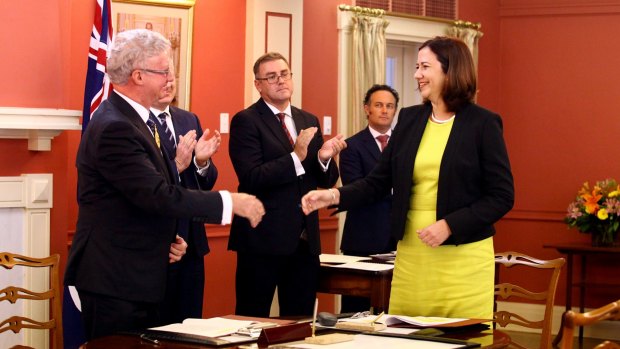 Queensland Premier Annastacia Palaszczuk is sworn in by Governor Paul de Jersey.