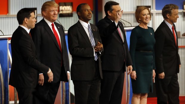 Republican presidential candidates, from left, Marco Rubio, Donald Trump, Ben Carson, Ted Cruz, Carly Fiorina and Rand Paul take the stage during the Republican presidential debate at Milwaukee Theatre on Tuesday.