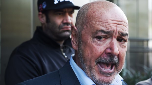 Dean Summers, the national co-ordinator of the International Transport Workers Federation, speaks outside the Coroners's Court in Glebe on Wednesday. 