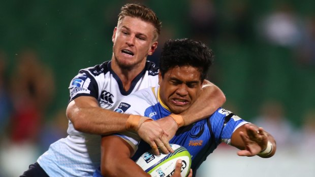 Tough year out west: Waratahs winger Rob Horne tackles Western Force's Ben Tapuai.
