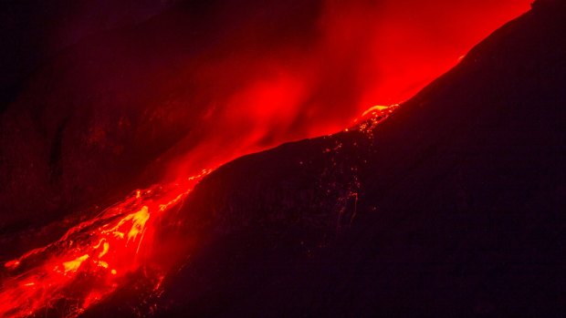 Molten lava from Mount Sinabung volcano is seen Karo district.