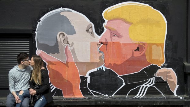 Election-era street art in Lithuania purports to show the extent of the special relationship between Vladimir Putin and Donald Trump.