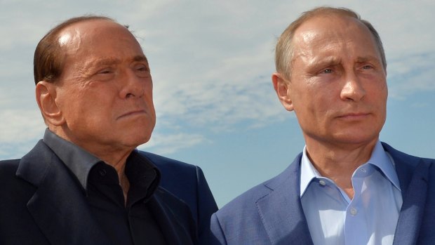 Russian President Vladimir Putin, right, with former Italian Prime Minister Silvio Berlusconi.