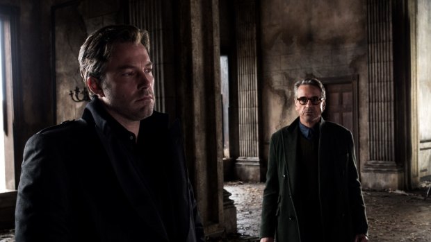 Ben Affleck, left, as Bruce Wayne and Jeremy irons as Alfred in Batman v Superman: Dawn of Justice.