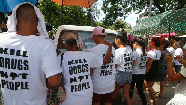 Relatives and supporters at the funeral of Leover Miranda protested his innocence. 