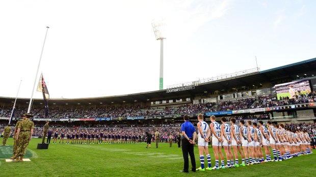 Fremantle and North Melbourne line up for ANZAC ceremonies at Domain Stadium.