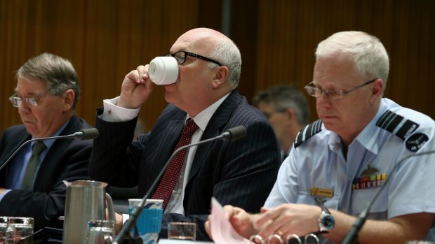 Department of Defence secretary Dennis Richardson, Attorney-General George Brandis and Chief of the Defence Force, Air Chief Marshal Mark Binskin at the Senate hearing.