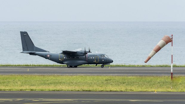 A French military transport plane in Saint-Denis. It will be the first time a plane has been used to search waters off the island's coast. 