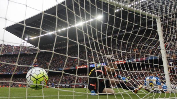 Back of the net: Barcelona's Neymar gets one past Espanyol's goalkeeper Pau Lopez.