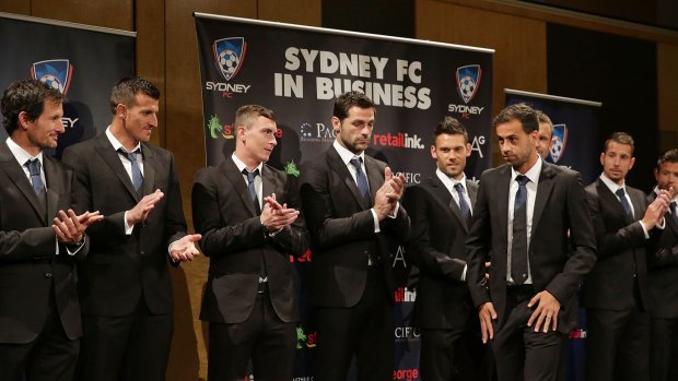 Honoured: Alex Brosque is applauded by teammates after being named Sydney FC captain on Wednesday. 
