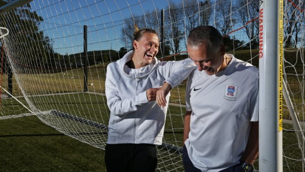 Daddy daughter day: Matildas star Emily van Egmond shares a laugh with father, Gary.