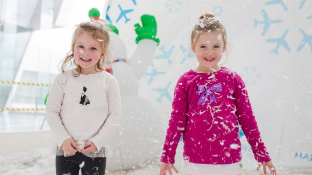 Friends, Amelia Bullock and Alexandra Bradford, both aged four, inside the snow globe.