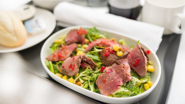 Salad of cumin spiced beef with zucchini, corn and a citris dressing will be served in economy and premium economy.