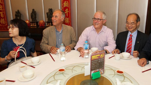 Prime Minister Malcolm Turnbull campaigning with Liberal incumbent John Alexander at a yum cha restaurant in Eastwood, Sydney, on Sunday.