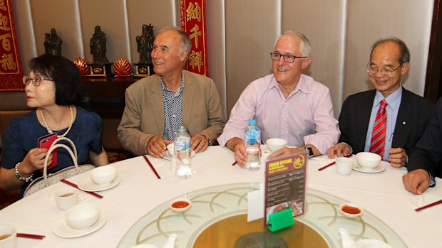 Prime Minister Malcolm Turnbull campaigning with Liberal incumbent John Alexander at a yum cha restaurant in Eastwood, Sydney, on Sunday.