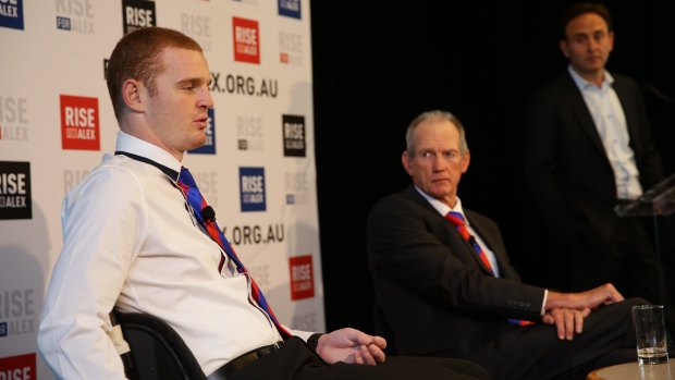 Father figure: Wayne Bennett with Alex McKinnon at the Knights forward's first press conference last year since suffering his spinal injury.
