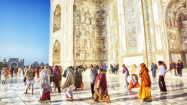 The Taj Mahal draws eight million visitors each year. 