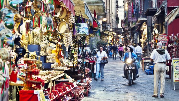 Bustling: A street market in reborn Naples.