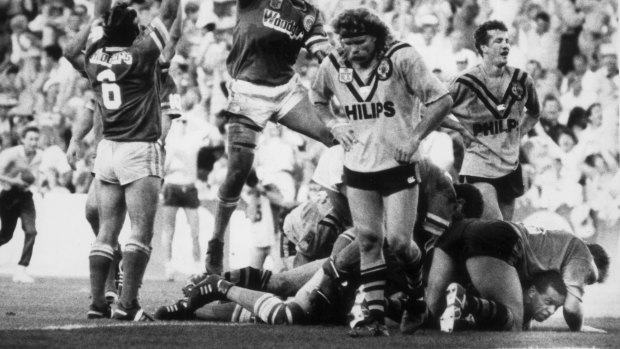 Hail Mary play: The Raiders celebrate the try by John Ferguson that sent the 1989 grand final into extra time.