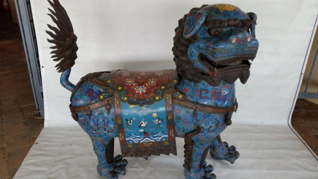 A large Cloisonne Heavenly Lion, or Fu Dog, from the Qing Dynasty in China. Estimated auction price $30,000-50,000.