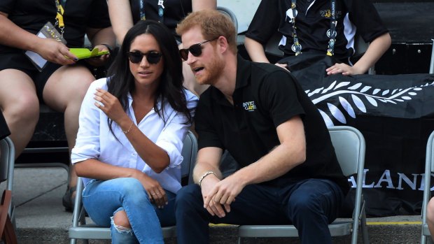 Prince Harry and his girlfriend Meghan Markle attend a wheelchair tennis event at the Invictus Games in Toronto, Monday, September 25, 2017.
