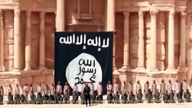 A screen grab from an Islamic State video shows the execution of Syrian soliders by IS teenage recruits in a Roman amphitheatre in Palmyra in the middle of this year.