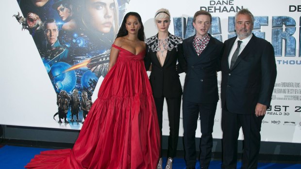 Actors from left Rihanna, Cara Delevingne and Dane DeHaan pose for photographers with director Luc Besson as they arrive for the premiere of 'Valerian and the City of a Thousand Planets' in London.