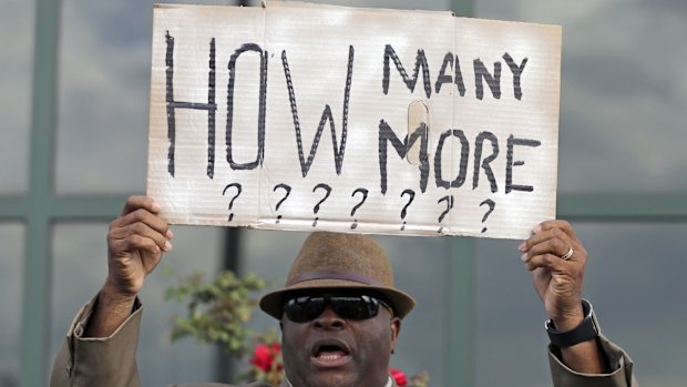 Protesting the shooting death of Walter Scott at a traffic stop in April, 2015.