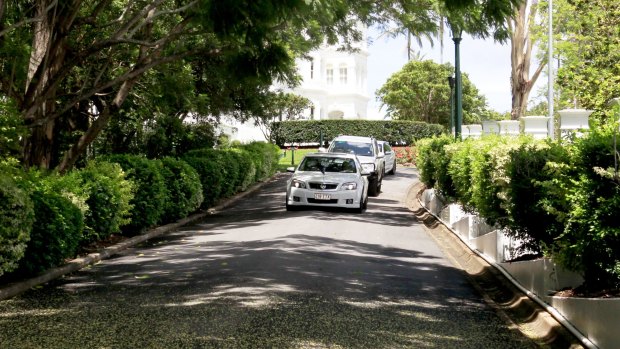 Queensland Premier Campbell Newman leaves Government House after calling an election. .