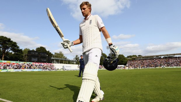 Joe Root leaves the field after being dismissed for 134 runs by Mitchell Starc.