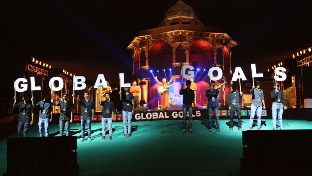 People hold up letters spelling "global goals" during the Delhi Action 2015 Global mobilisation event last month.