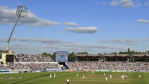 England players celebrate Steve Finn's removal of Australia's Mitch Johnson on day two of the third Ashes Test at Edgbaston.