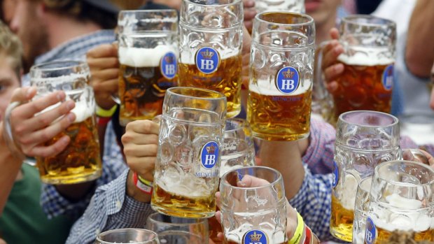 People celebrate the opening of the 182nd Oktoberfest beer festival in Munich, southern Germany, in September. 