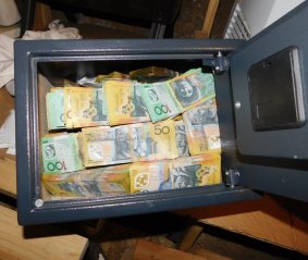 A safe containing $377,905 in cash was found hidden under the Phillip home of Chang-Kee Song. 