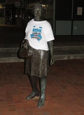 The Stepping Out statue in Hughes politically decorated.