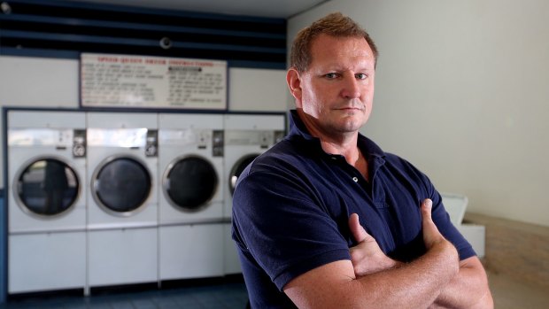 Disgruntled laundry operator Dennis Beecroft is angry with the Brisbane Roar, saying he is owed thousands of dollars.