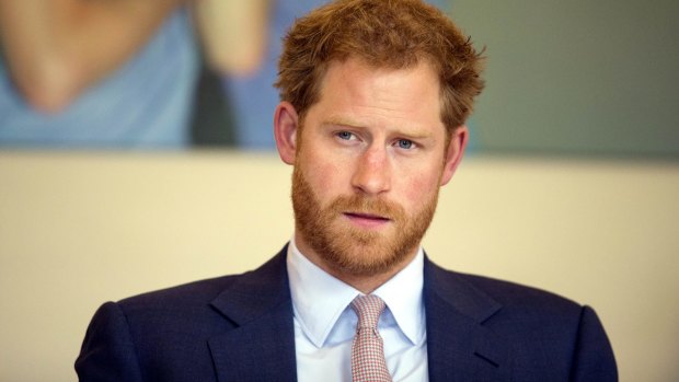 Britain's Prince Harry takes part in a round table discussion with HIV doctors at King's College Hospital in south London in June.