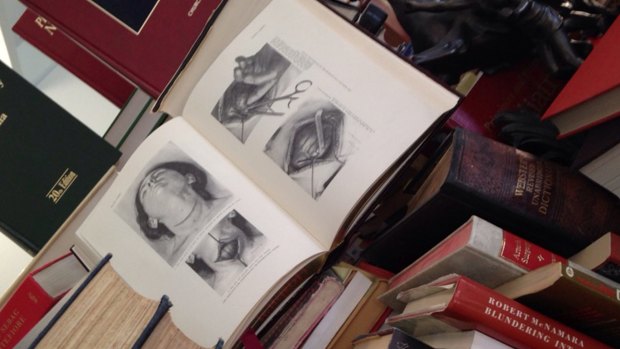 A surgeon's bookshelves contain images that would make the rest of us wince.