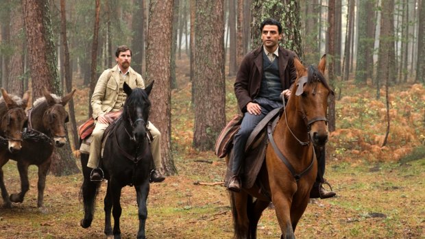 Christian Bale (left) and Oscar Isaac star in the film that tackles the Armenian genocide, albeit from a distance.