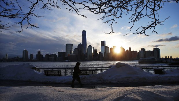 Financial professionals planned to work from home or in remote offices, as the storm threatens to dump up to 3 feet of snow on the US East Coast.