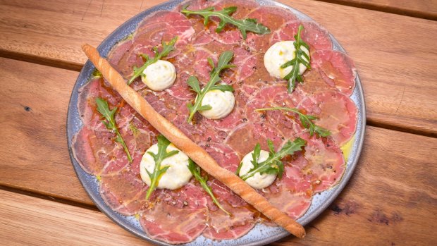 Beef carpaccio, sliced as thin as tissue paper, with tuna mayonnaise.